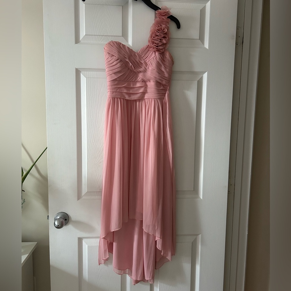 One shoulder pink bridesmaid dress adorned with flower